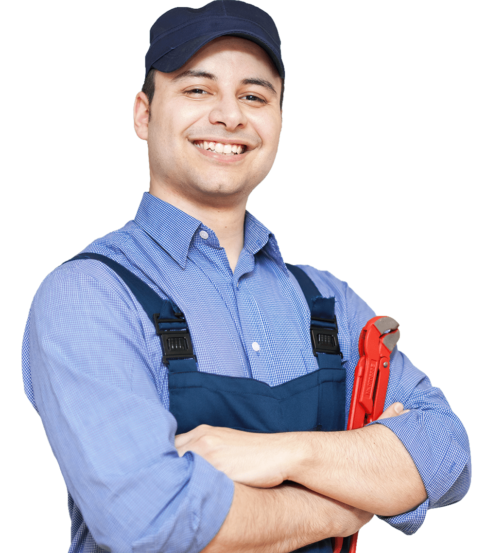 Smiling plumber in blue work uniform and cap, holding a pair of red pipe wrenches, conveying a friendly and professional demeanor.